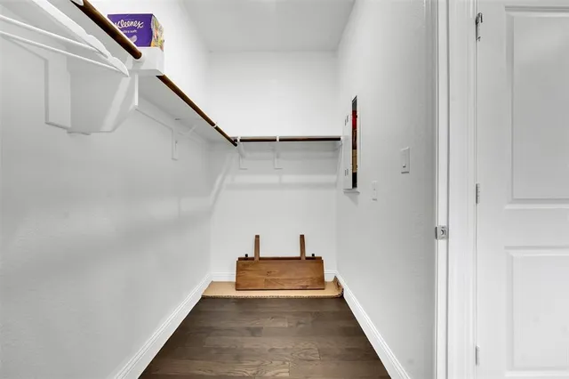 a view of a hallway with closet