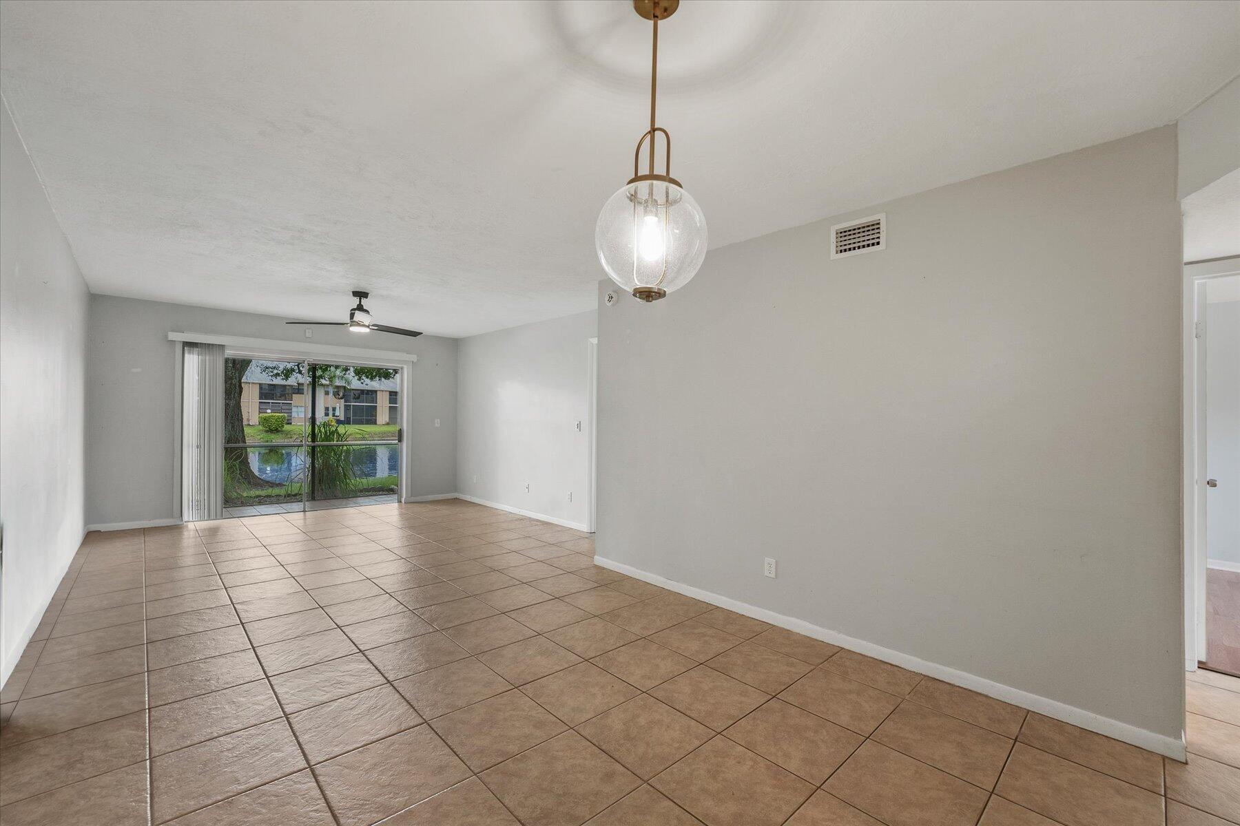 3151 Southeast Aster Lane, Unit 1302 Stuart, FL 34994 - Photo 5 of 23 a view of an empty room with a window