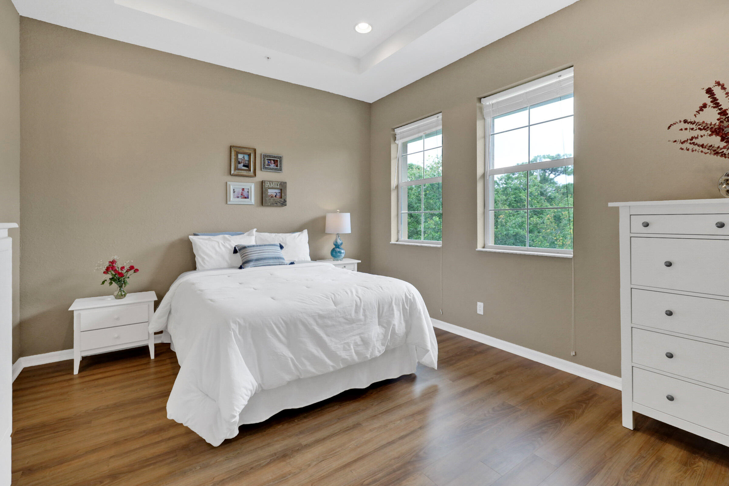 1582 Grande Cull Way Jupiter, FL 33458 - Photo 26 of 75 a bedroom with a bed and a window
