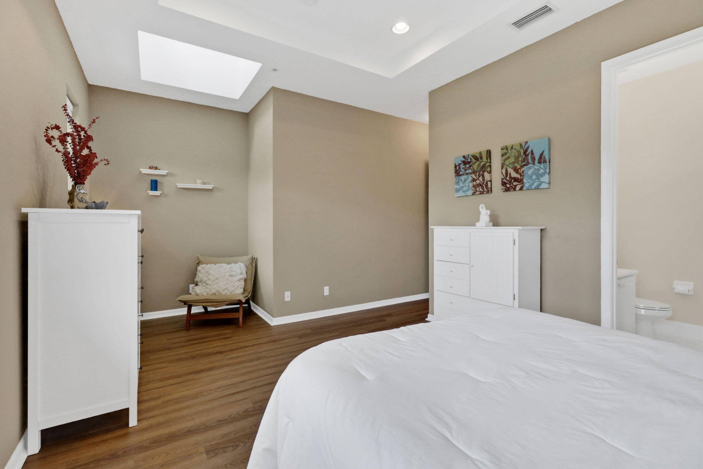 1582 Grande Cull Way Jupiter, FL 33458 - Photo 28 of 75 a bedroom with a bed and wooden floor