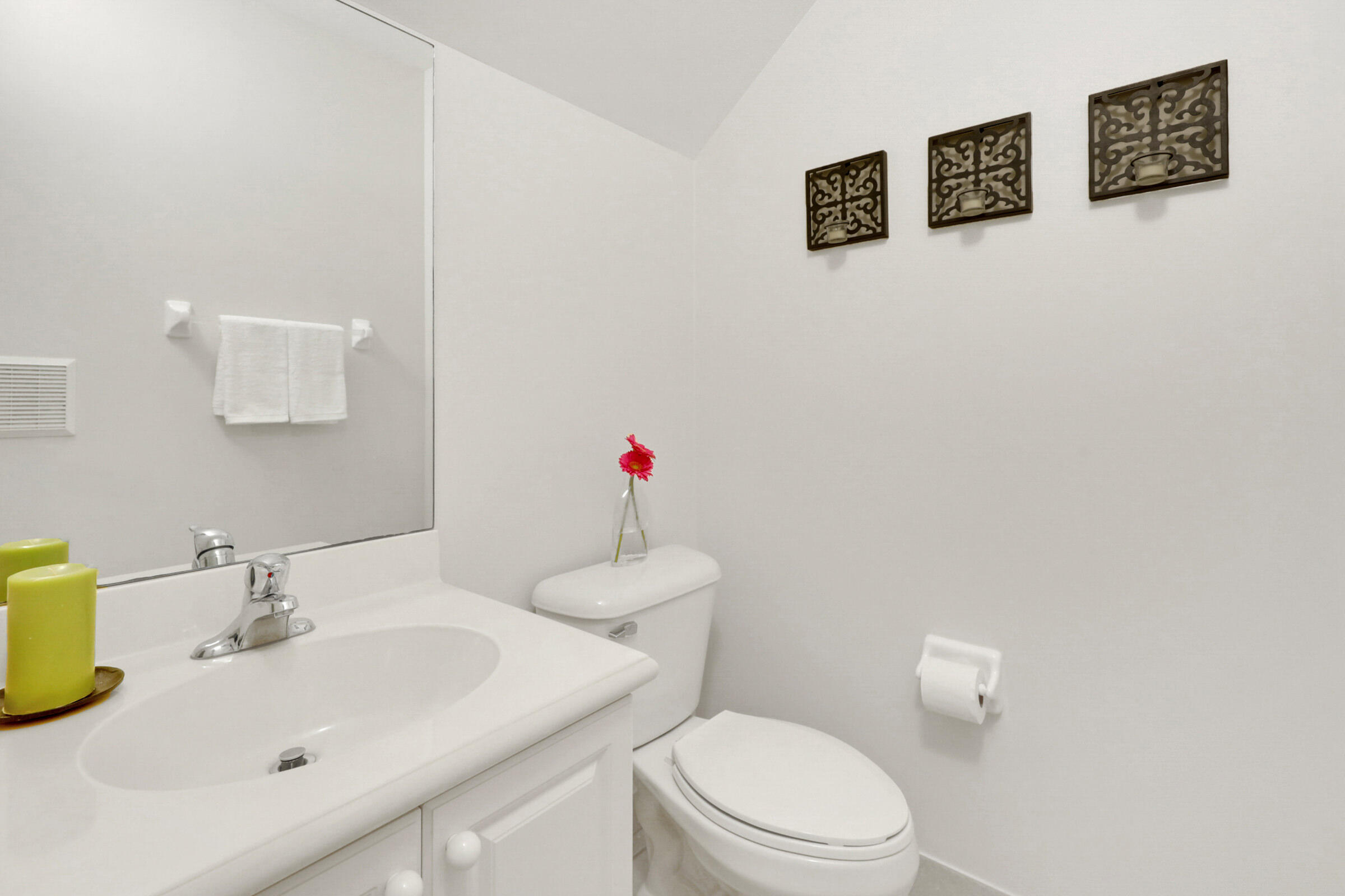 1582 Grande Cull Way Jupiter, FL 33458 - Photo 8 of 75 a bathroom with a sink mirror and toilet