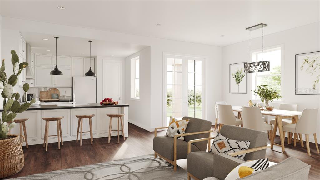 Woodlea Road Tavares, FL 32778 - Photo 14 of 63 a living room with furniture a large window and a table