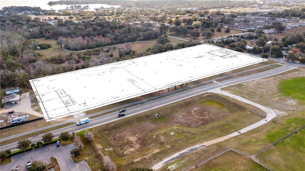 Woodlea Road Tavares, FL 32778 - Photo 31 of 63 a view of swimming pool with a yard
