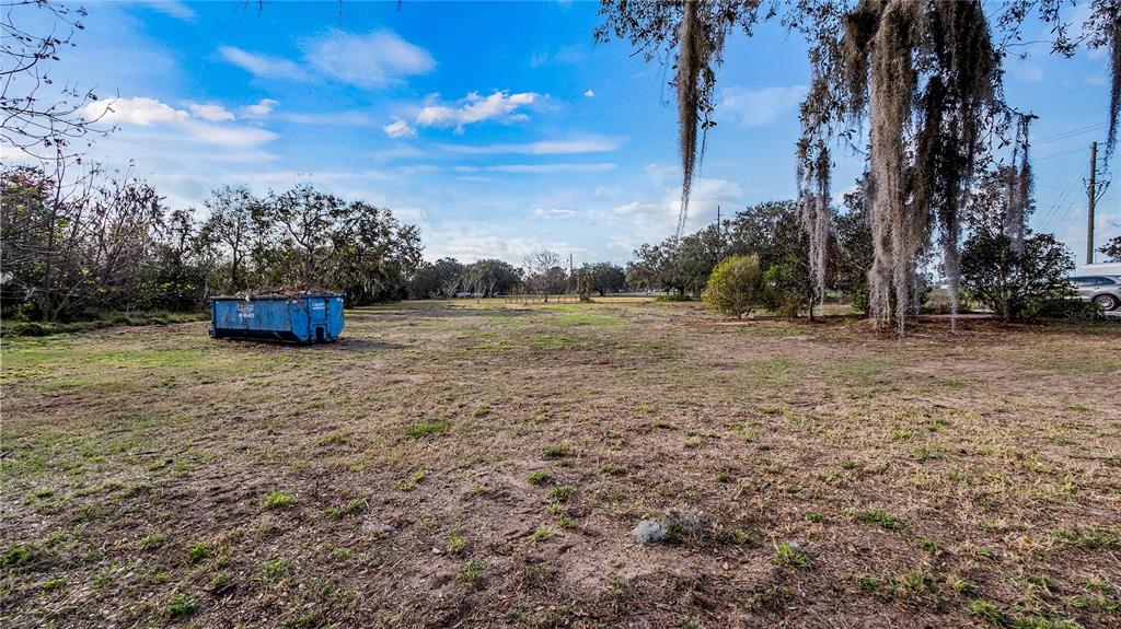 Woodlea Road Tavares, FL 32778 - Photo 36 of 63 a view of a field with trees in the background