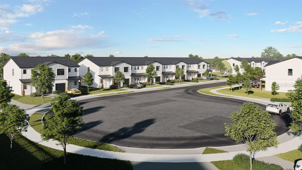 Woodlea Road Tavares, FL 32778 - Photo 4 of 63 a city view with tall buildings and cars parked