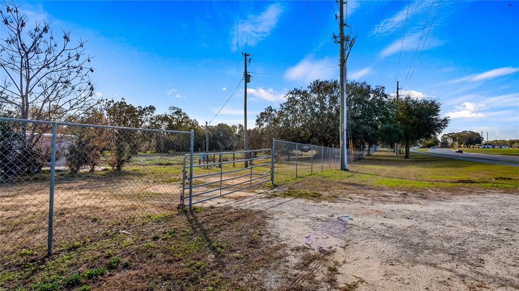 Woodlea Road Tavares, FL 32778 - Photo 56 of 63 a view of a house with a swimming pool
