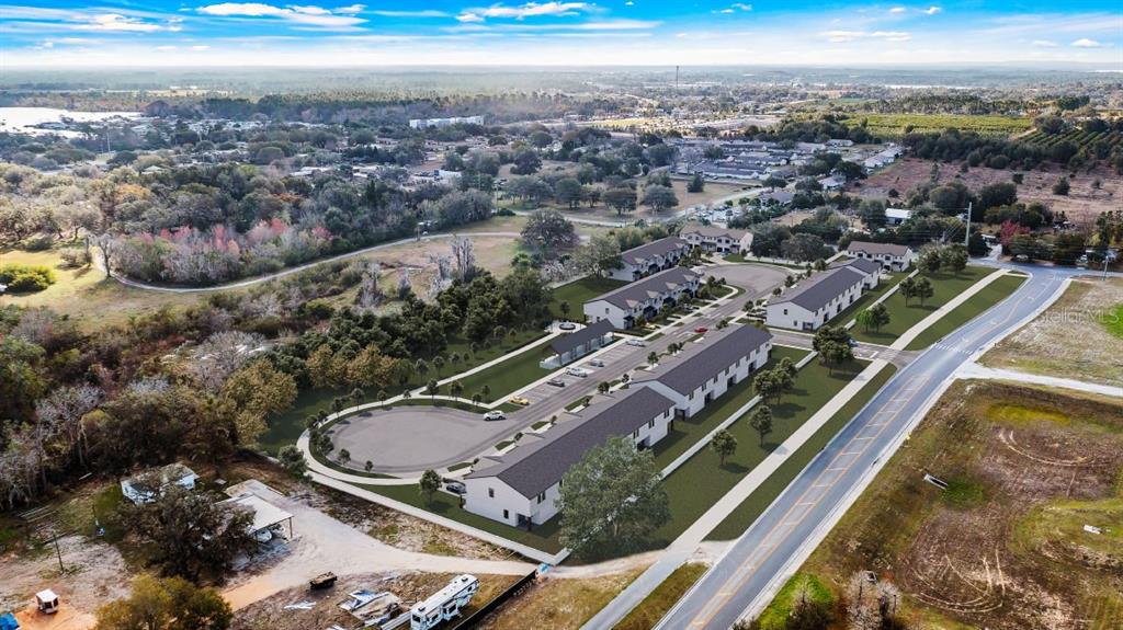Woodlea Road Tavares, FL 32778 - Photo 9 of 63 an aerial view of residential houses with outdoor space
