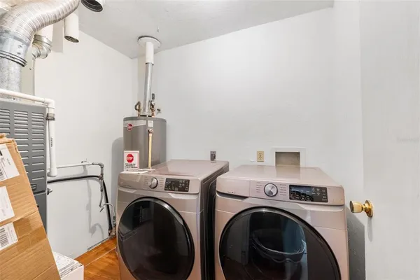 a utility room with dryer and washer