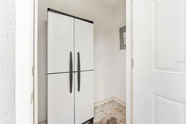 a view of house with yard and green space