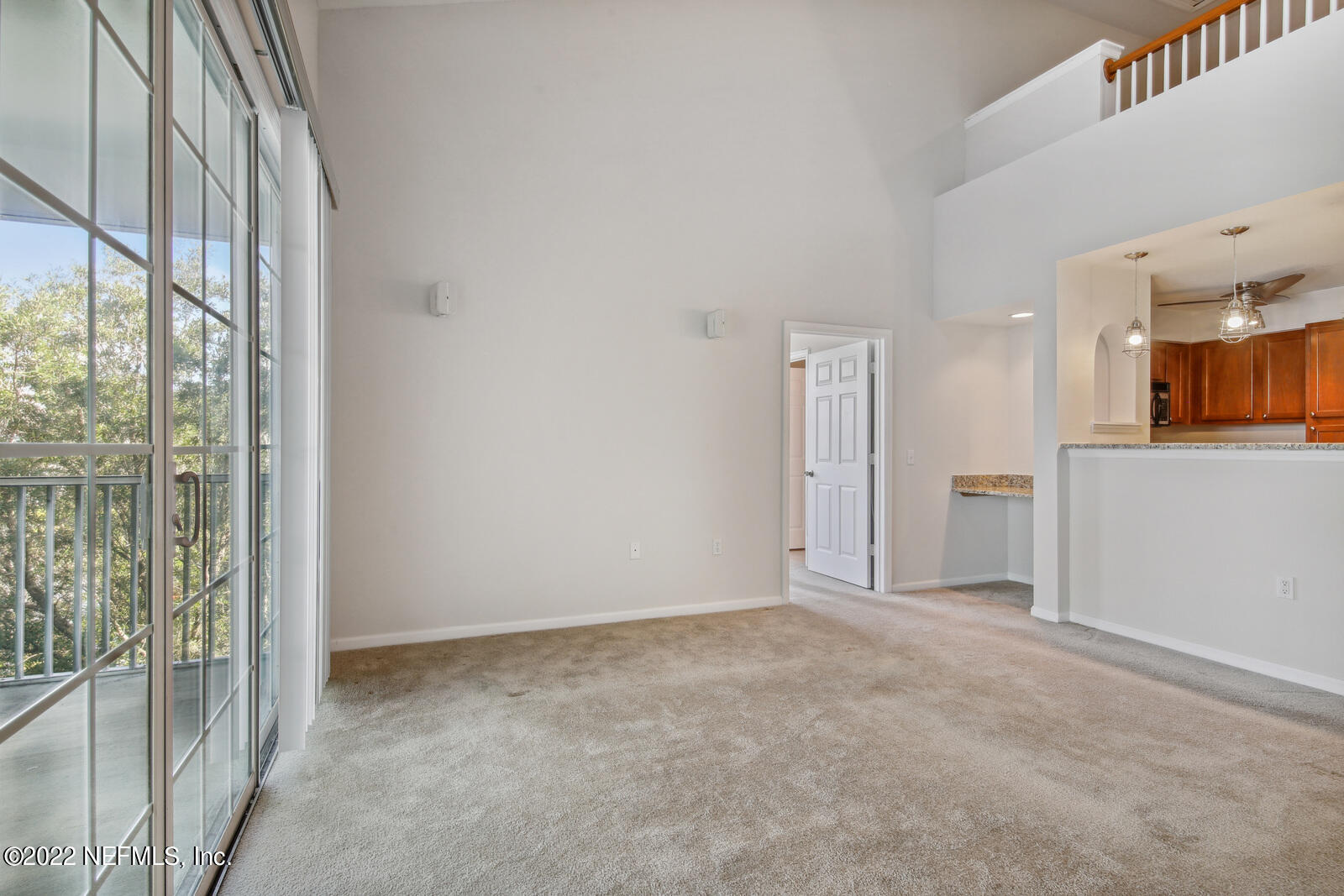 8550 Touchton Road, Unit 1438 Jacksonville, FL 32216 - Photo 11 of 37 a view of an empty room with a window