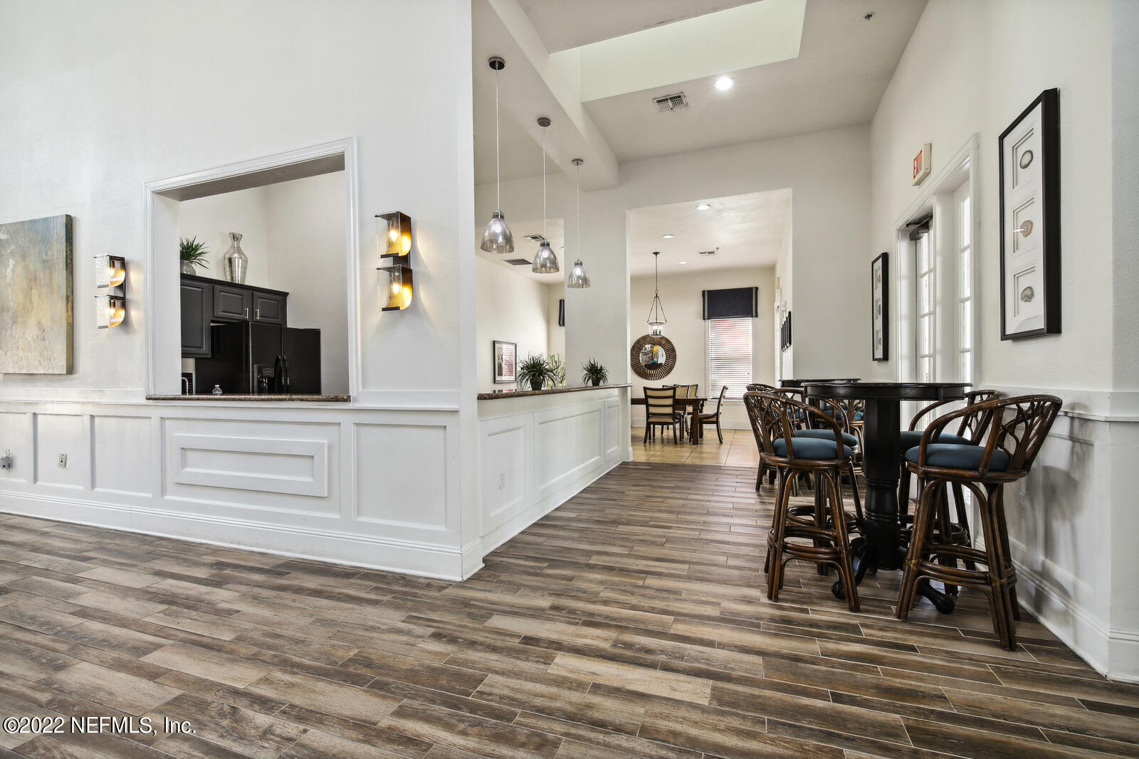 8550 Touchton Road, Unit 1438 Jacksonville, FL 32216 - Photo 28 of 37 a view of kitchen with cabinets and wooden floor