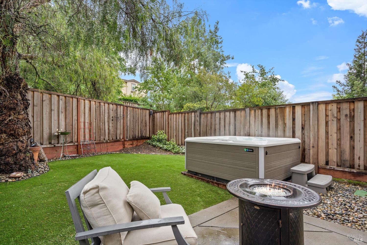 2084 Cooper Drive Santa Rosa, CA 95404 - Photo 4 of 39 Fully fenced with fire pit, hot tub, and turf!
