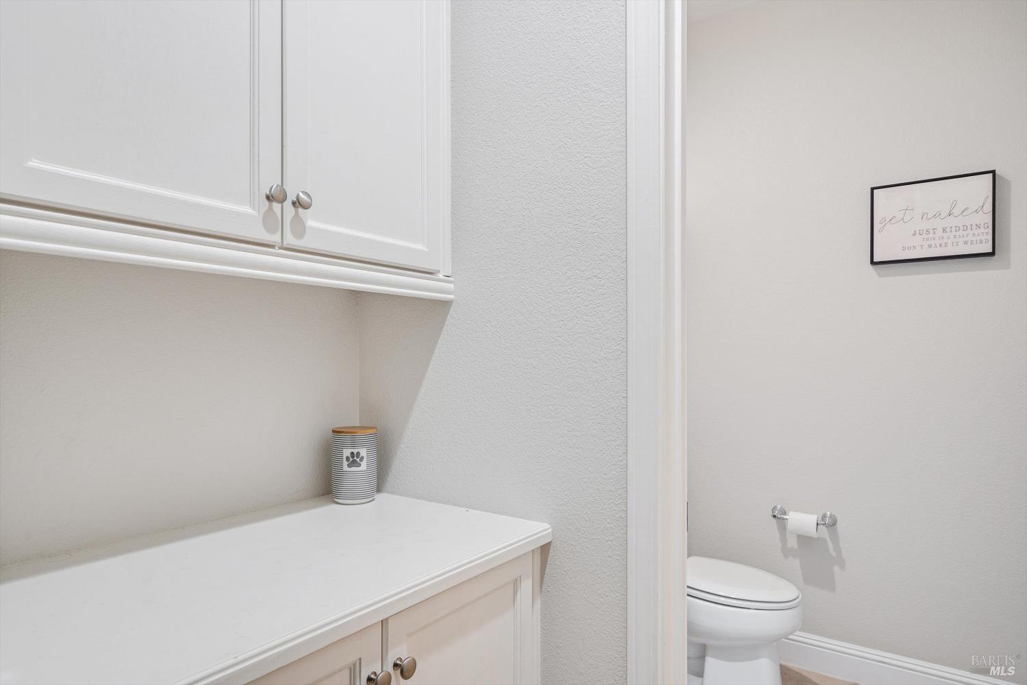 2084 Cooper Drive Santa Rosa, CA 95404 - Photo 9 of 37 Half bath with storage just outside. This area is to the right