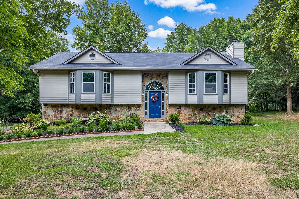 3491 Greggs Road Gainesville, GA 30507 - Photo 1 of 1 a front view of a house with a yard