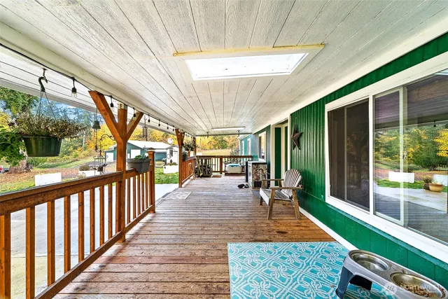 a view of a patio with a table chairs and a patio