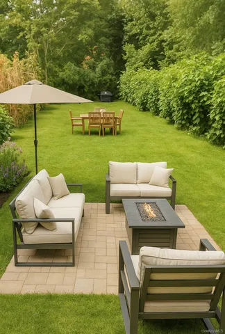 a view of yard with seating area and trees