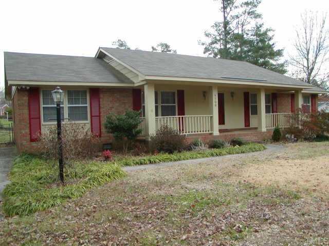 4705 Greenbrier Road Raleigh, NC 27603 - Photo 1 of 1 a front view of a house with garden
