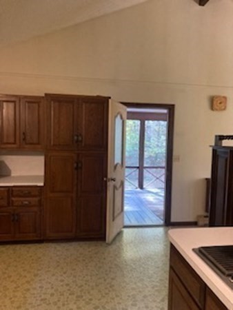 298 Haydenville Road Whately, MA 01093 - Photo 17 of 33 an empty room with wooden floor and cabinet