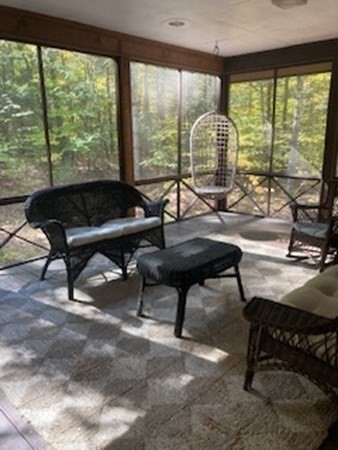 298 Haydenville Road Whately, MA 01093 - Photo 20 of 33 a living room filled with furniture and a large window