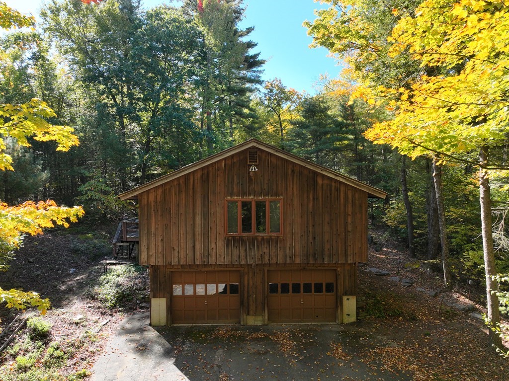 298 Haydenville Road Whately, MA 01093 - Photo 27 of 33 a view of a wooden house with a yard