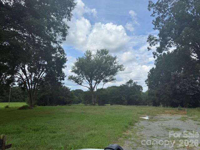 4114 McManus Road, Unit 1 Monroe, NC 28112 - Photo 3 of 4 a view of field with trees in the background