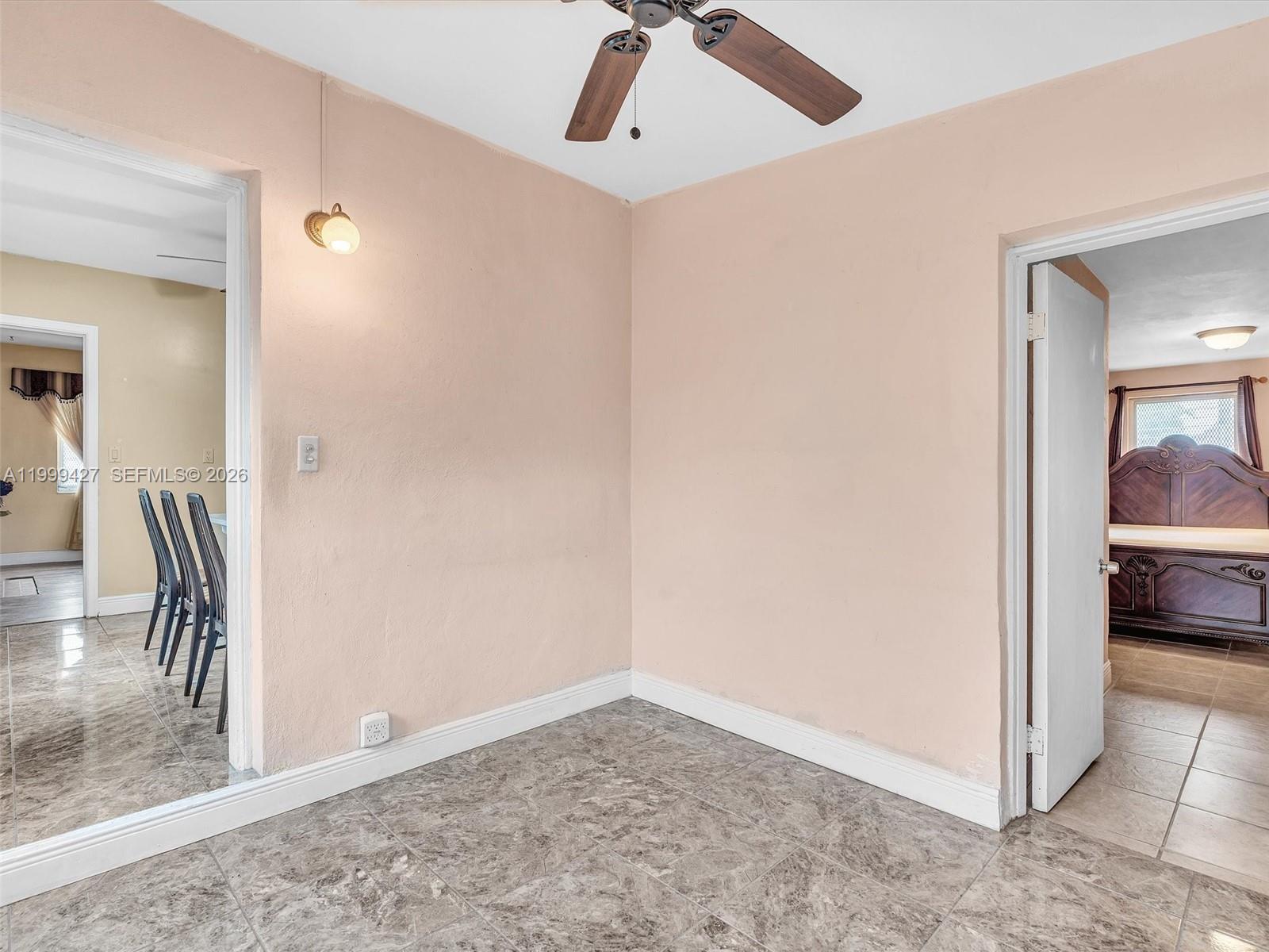 10 Southwest 72nd Avenue Miami, FL 33144 - Photo 12 of 35 a view of a hallway with a view of living room
