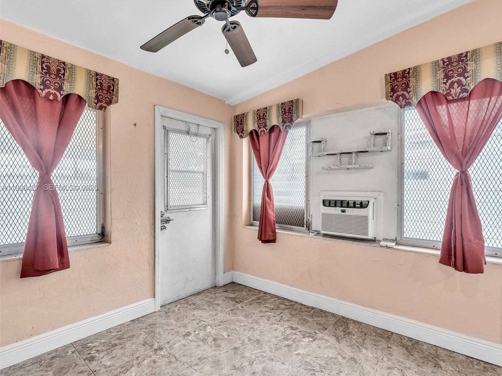 10 Southwest 72nd Avenue Miami, FL 33144 - Photo 13 of 35 a view of a livingroom with a staircase