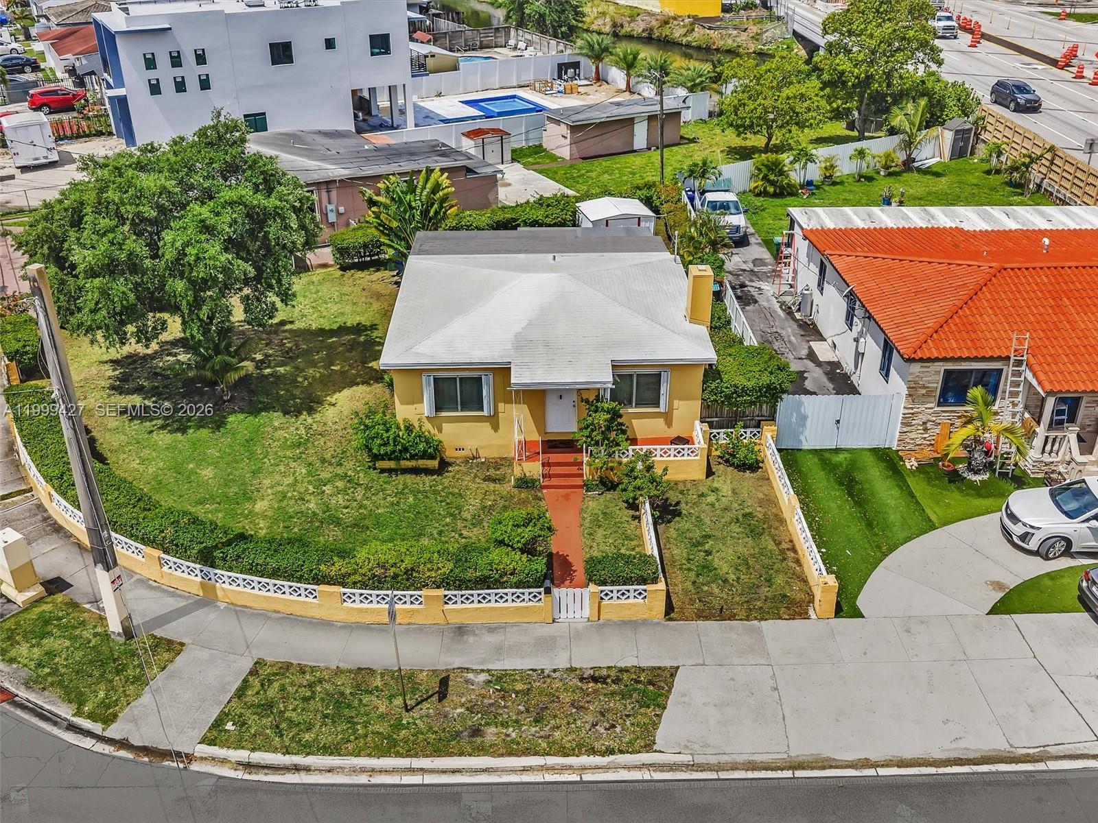 10 Southwest 72nd Avenue Miami, FL 33144 - Photo 30 of 35 front view of a house with a garden