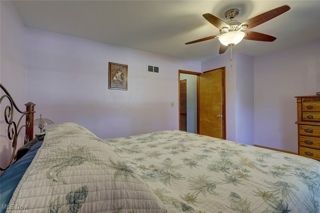 1525 Root Road Lorain, OH 44052 - Photo 19 of 41 Bedroom with ceiling fan