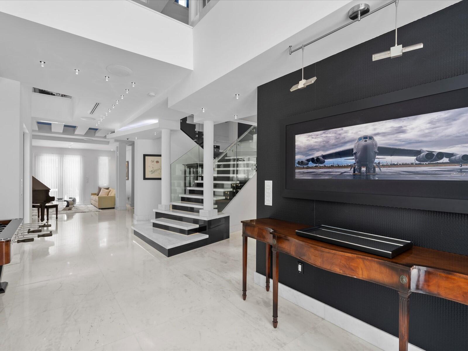 3917 South Le Jeune Road Miami, FL 33146 - Photo 37 of 91 a projector room with fireplace furniture and a flat screen tv