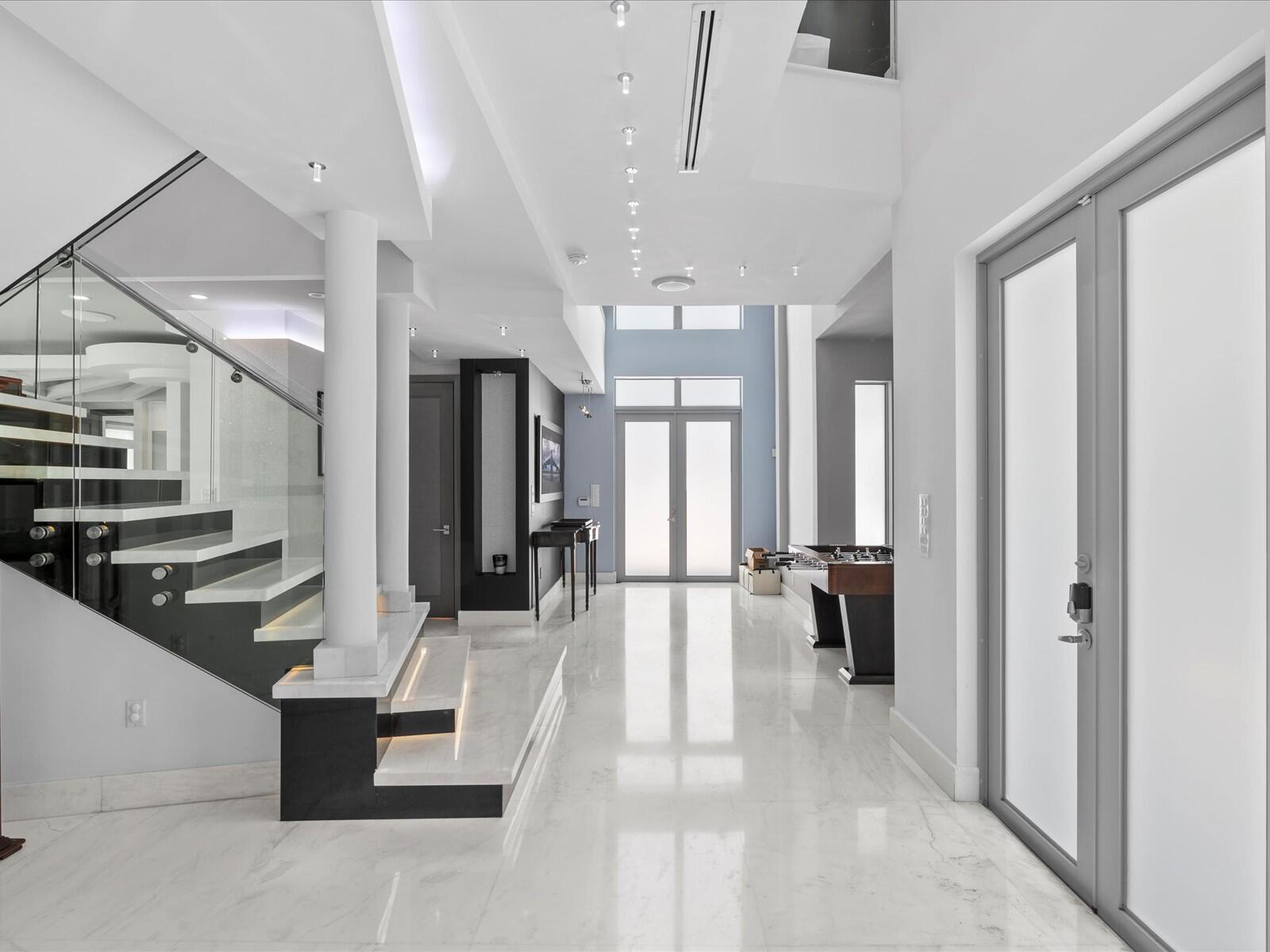 3917 South Le Jeune Road Miami, FL 33146 - Photo 40 of 91 a lobby with furniture and floor to ceiling window