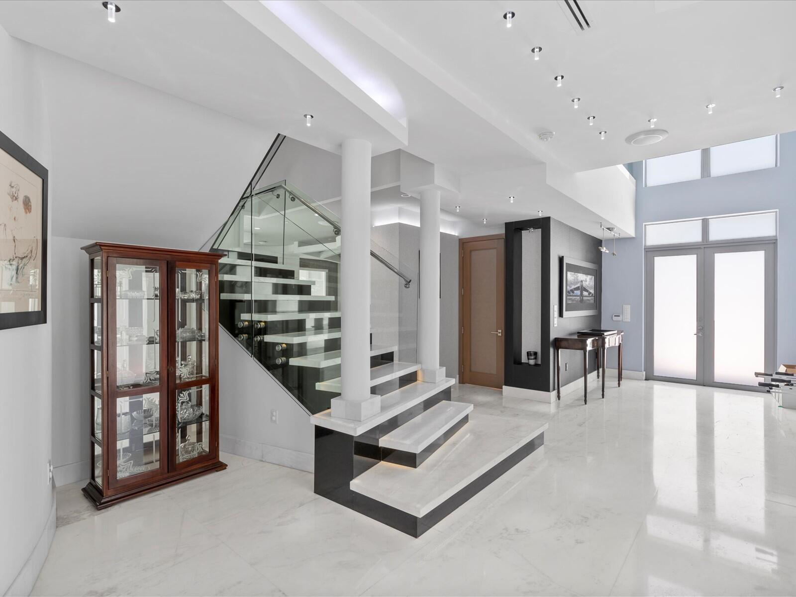 3917 South Le Jeune Road Miami, FL 33146 - Photo 41 of 91 a living room with lots of furniture and a chandelier