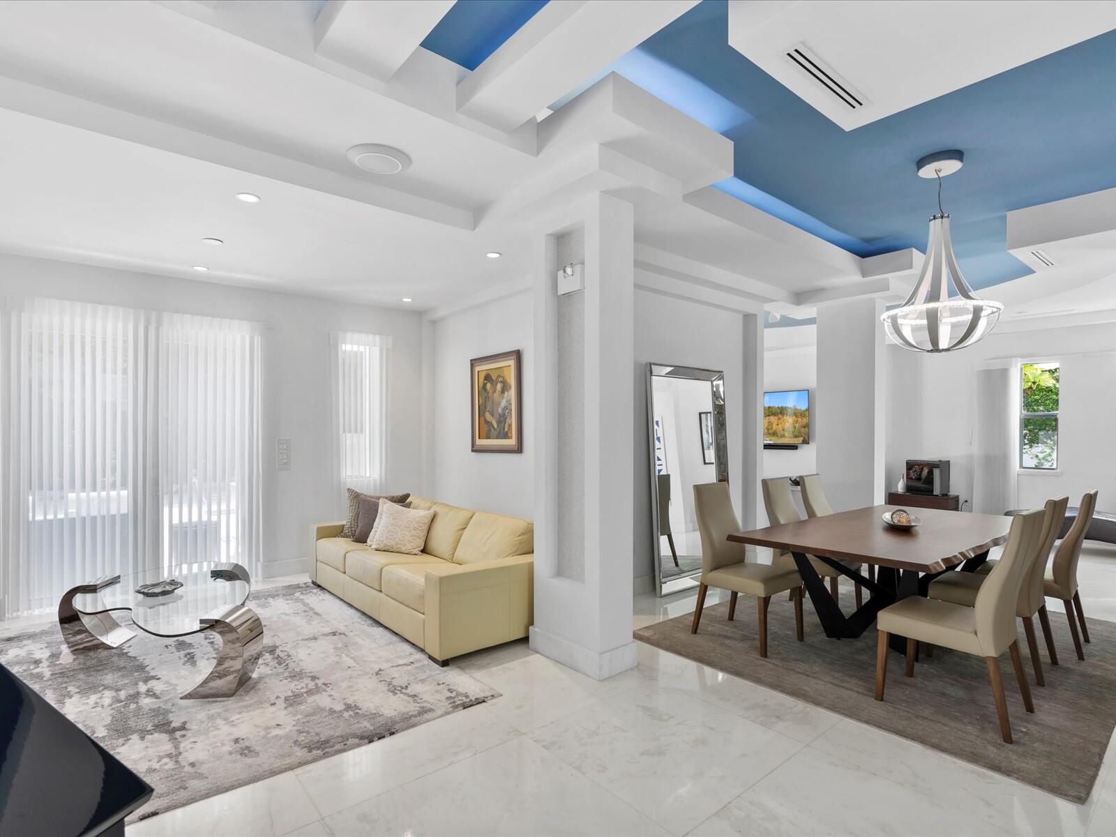 3917 South Le Jeune Road Miami, FL 33146 - Photo 42 of 91 a living room with furniture and a large window