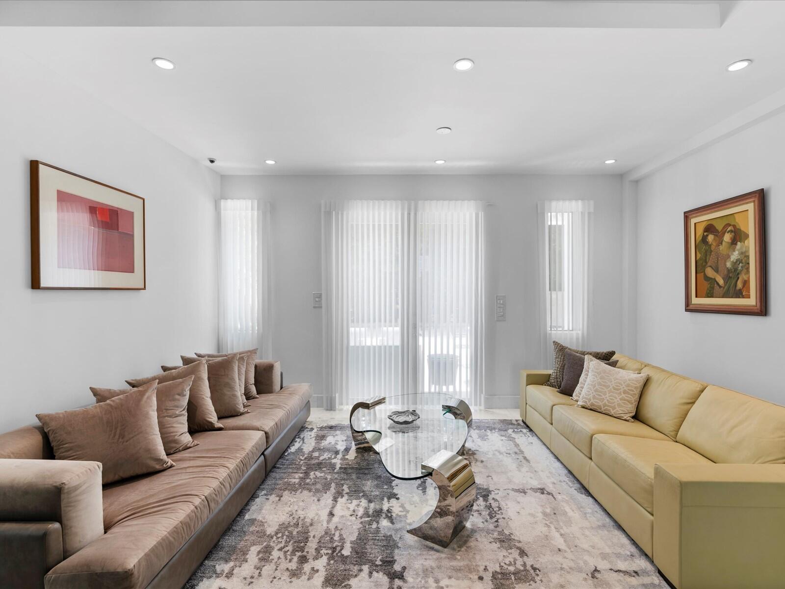 3917 South Le Jeune Road Miami, FL 33146 - Photo 44 of 91 a living room with furniture and large window