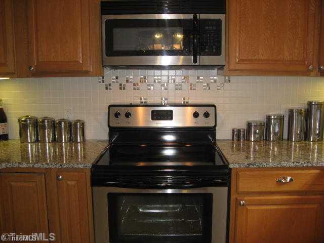 3500 Edgefield Road Greensboro, NC 27409 - Photo 5 of 16 Kitchen. Another view of the kitchen...
