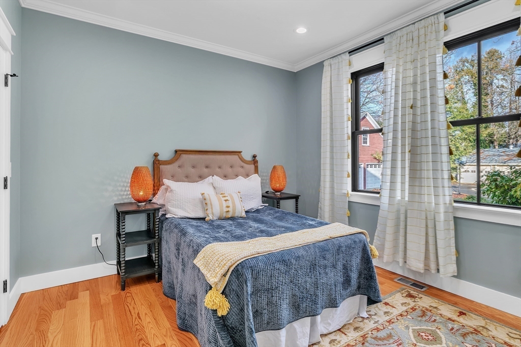 37 Landy Avenue Northampton, MA 01062 - Photo 19 of 41 a bedroom with a bed and wooden floor