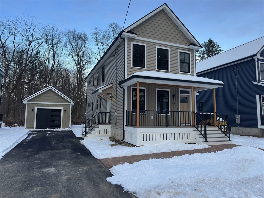 37 Landy Avenue Northampton, MA 01062 - Photo 3 of 41 a front view of a house with a porch