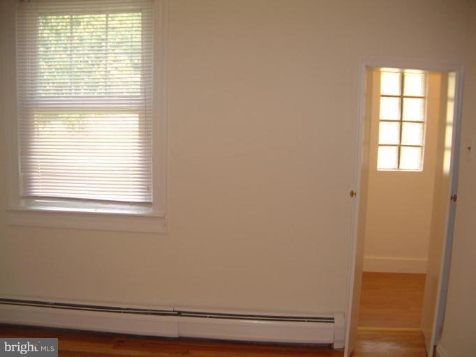 13919 Overton Lane Silver Spring, MD 20904 - Photo 12 of 16 a view of an empty room with a window