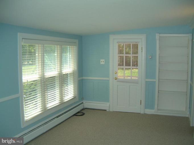 13919 Overton Lane Silver Spring, MD 20904 - Photo 4 of 16 a view of an empty room with a window
