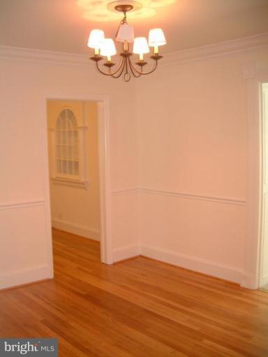 13919 Overton Lane Silver Spring, MD 20904 - Photo 6 of 16 a view of empty room with wooden floor
