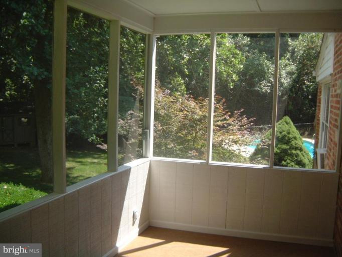 13919 Overton Lane Silver Spring, MD 20904 - Photo 7 of 16 a view of a room and a large window