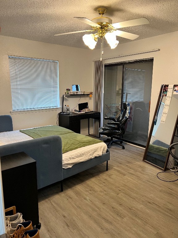 2510 San Gabriel Street, Unit 301 Austin, TX 78705 - Photo 16 of 22 a living room with furniture and a flat screen tv