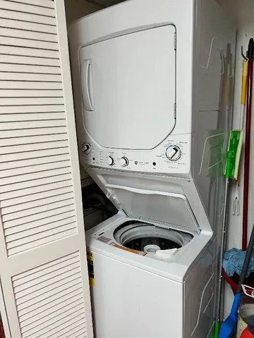 a bedroom with a bed and a desk