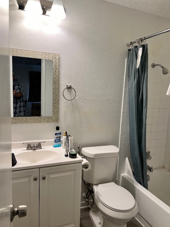 2510 San Gabriel Street, Unit 301 Austin, TX 78705 - Photo 20 of 22 a white toilet sitting next to a bathroom sink