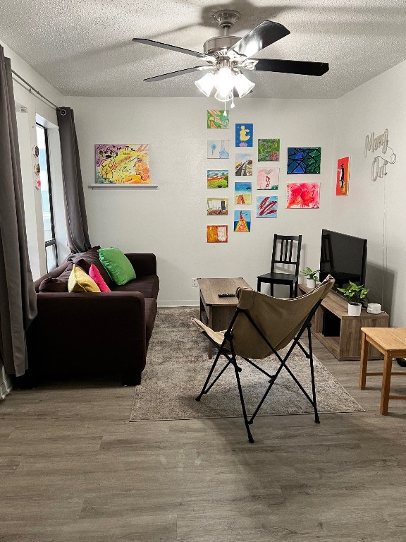 2510 San Gabriel Street, Unit 301 Austin, TX 78705 - Photo 3 of 22 a living room with furniture and a flat screen tv