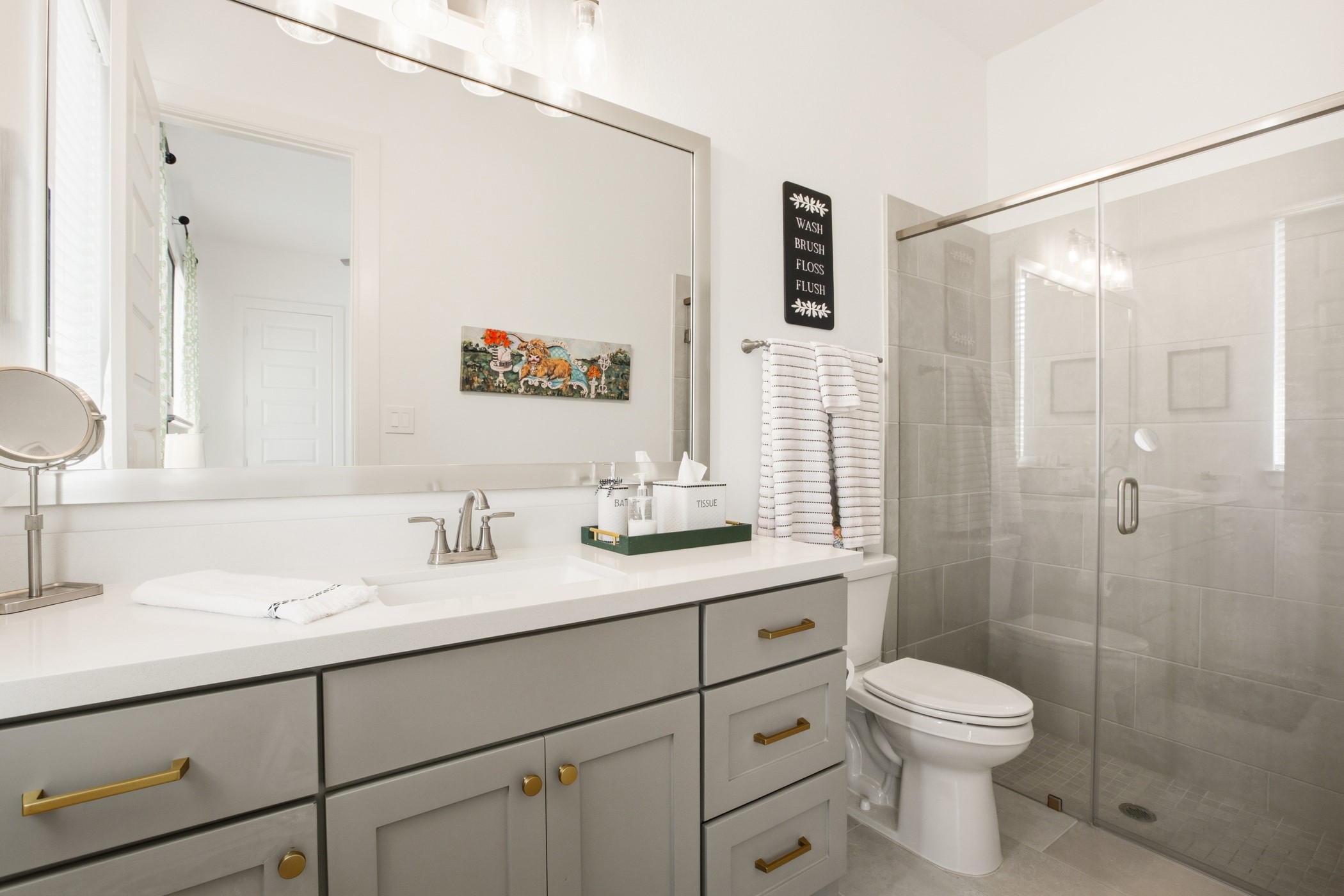 5422 Farm Hill Way Fulshear, TX 77406 - Photo 33 of 50 a bathroom with a double vanity sink toilet and shower