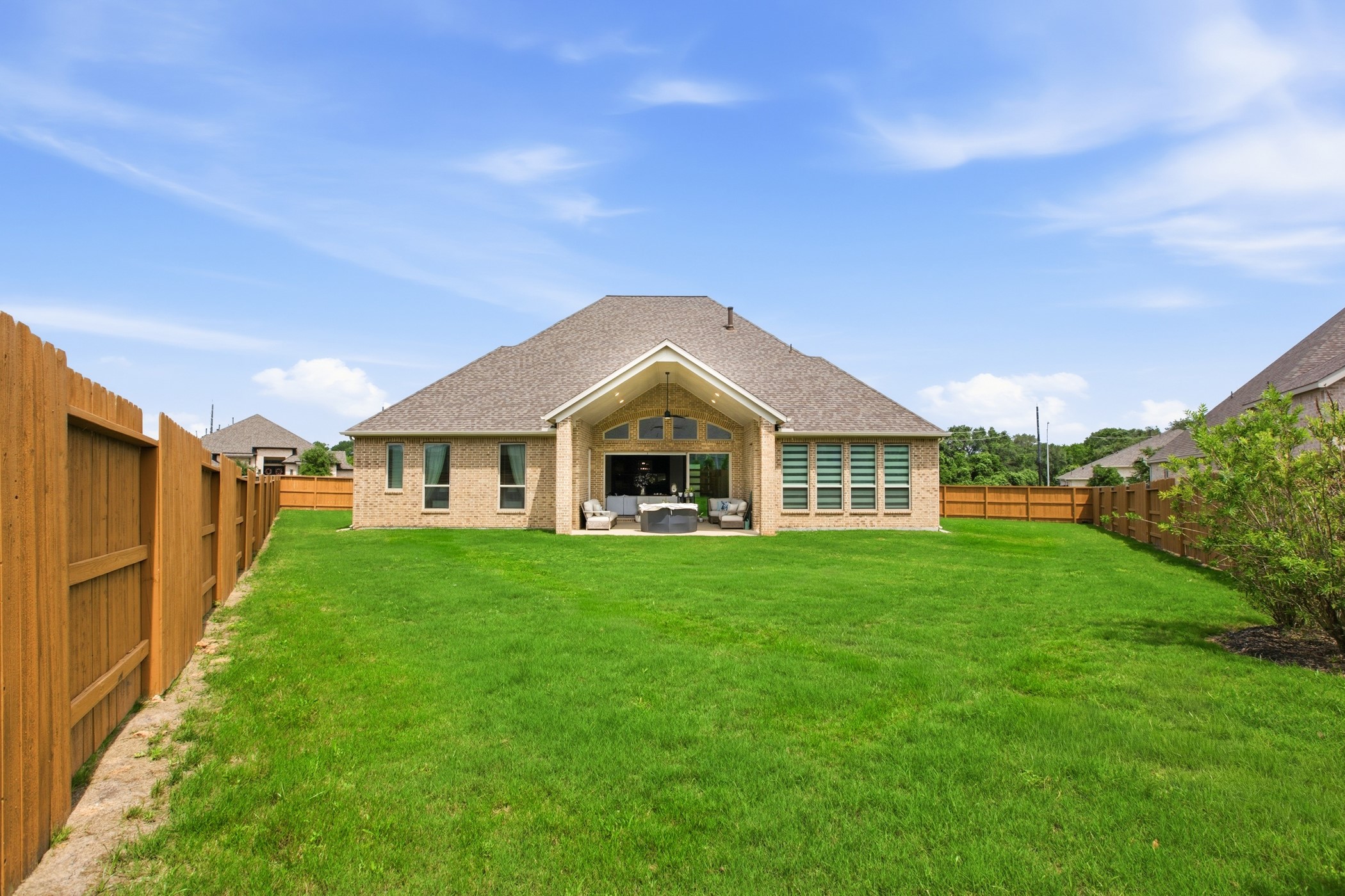 5422 Farm Hill Way Fulshear, TX 77406 - Photo 46 of 50 a view of a big yard next to a house with a yard