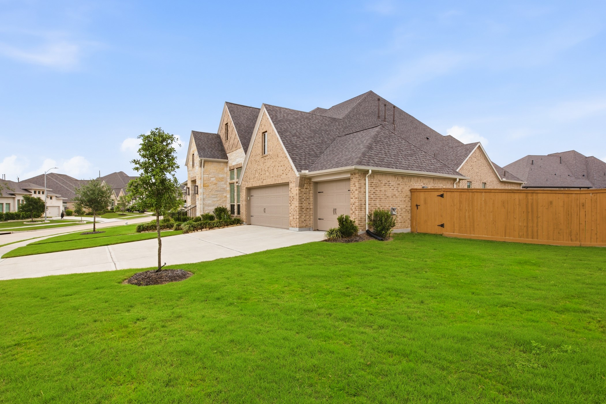 5422 Farm Hill Way Fulshear, TX 77406 - Photo 47 of 50 a house view with a garden space