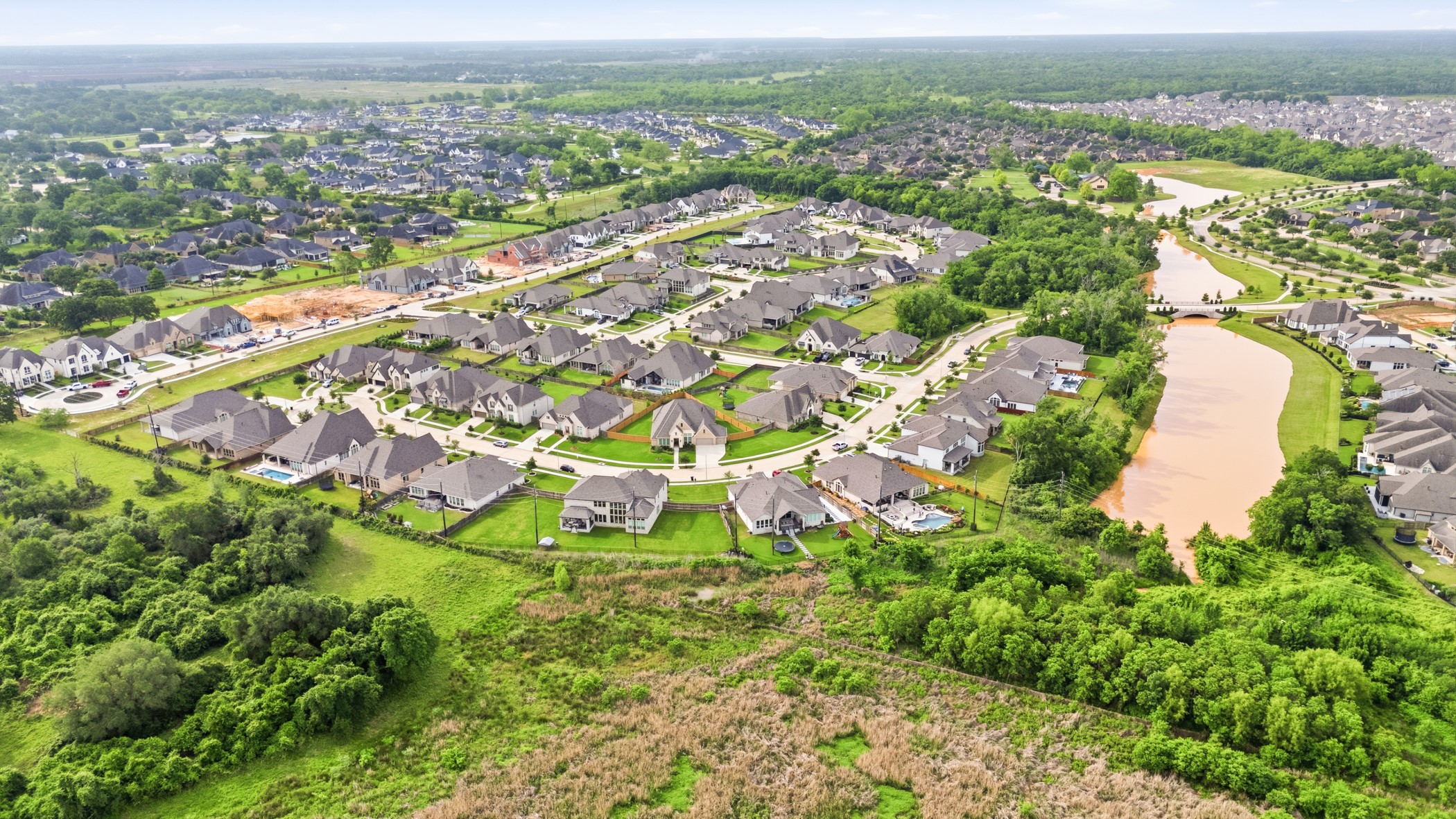 5422 Farm Hill Way Fulshear, TX 77406 - Photo 50 of 50 an aerial view of residential houses with outdoor space and trees
