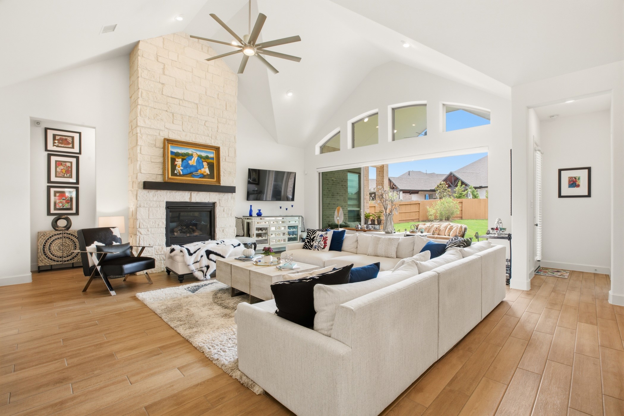 5422 Farm Hill Way Fulshear, TX 77406 - Photo 7 of 50 a living room with fireplace furniture and a large window